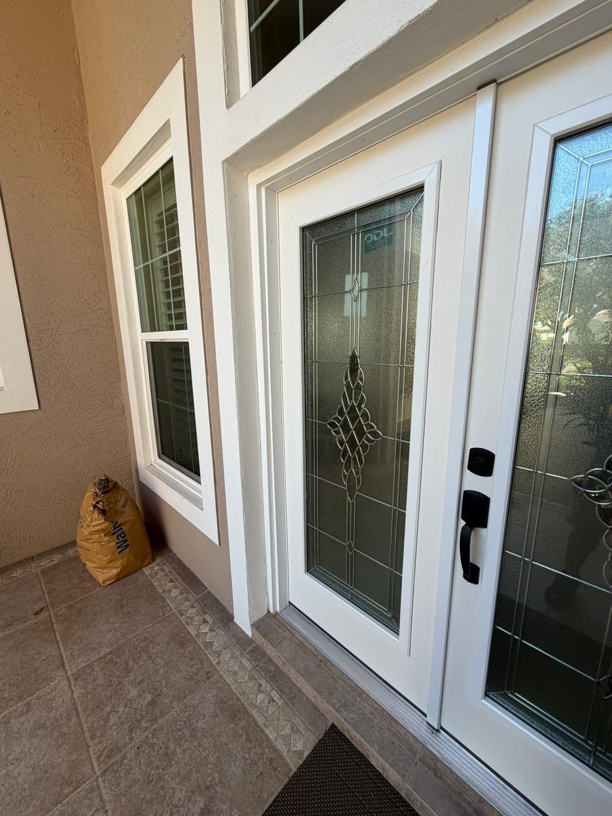 White double entry doors with decorative glass in Venice, FL