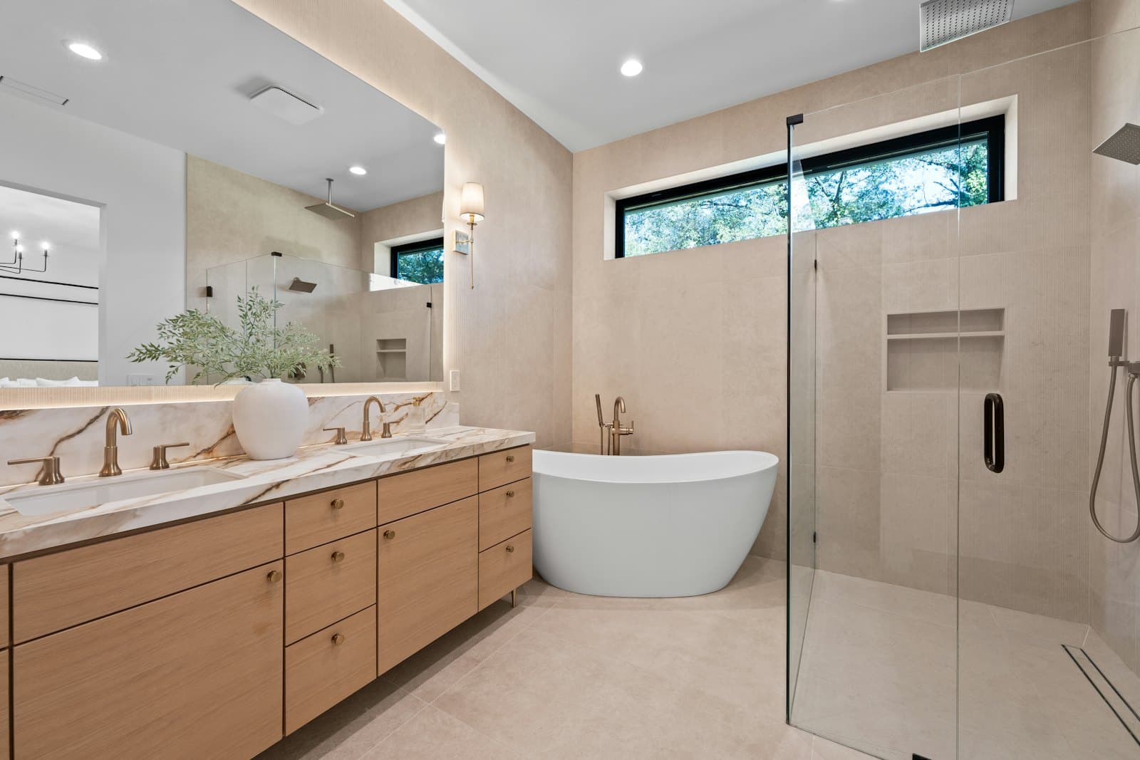 Primary bathroom with a freestanding soaking tub and double vanity