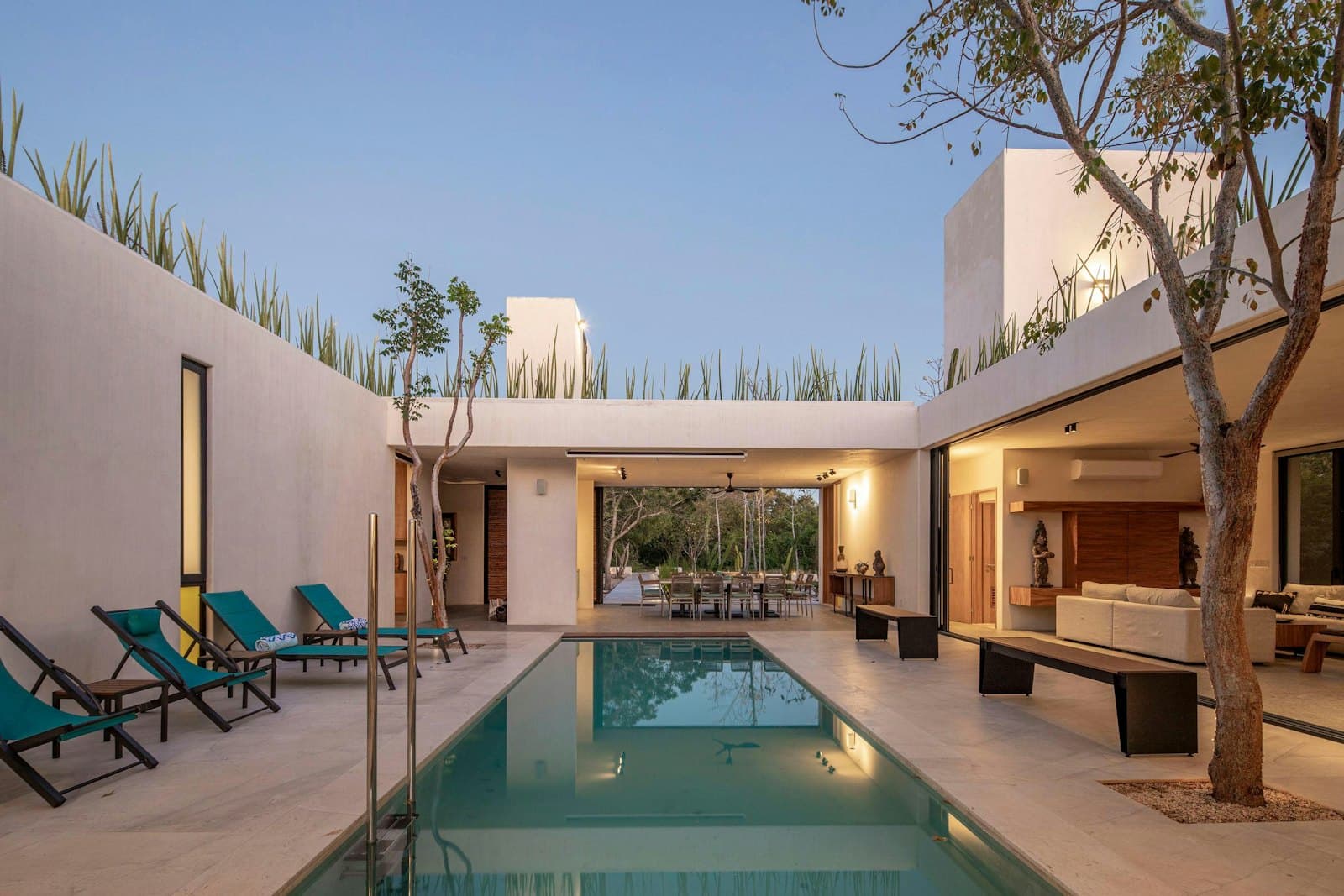 Courtyard swimming pool with lounge chairs