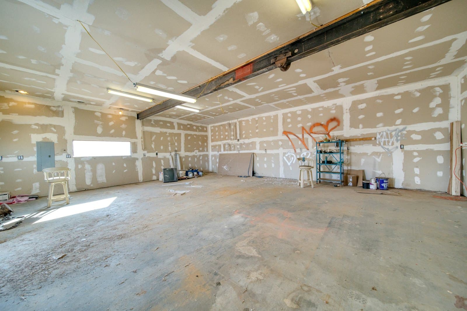 Interior walls patched and primed during restoration